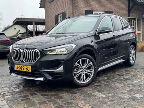 BMW X1 sDrive 2.0i 192pk autom ecc,beigeleer,lmv,navi,led,chroom,dglas,camera